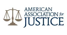 Insignia de la Asociación Estadounidense por la Justicia