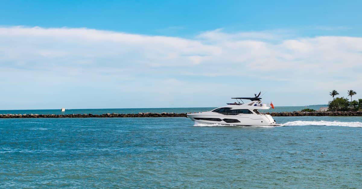 Cabin cruiser heading out to sea. | Bernheim Kelley Injury Lawyers