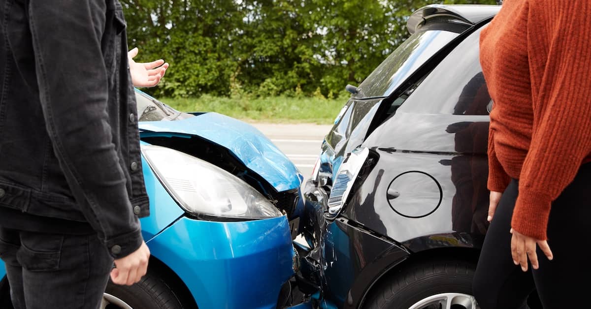 Two drivers at scene of car accident. | Bernheim Kelley Injury Lawyers