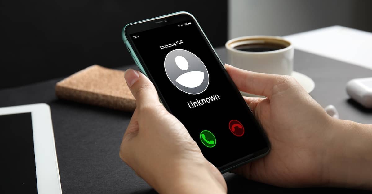 Cell phone with debt collector calling. | Bernheim Kelley