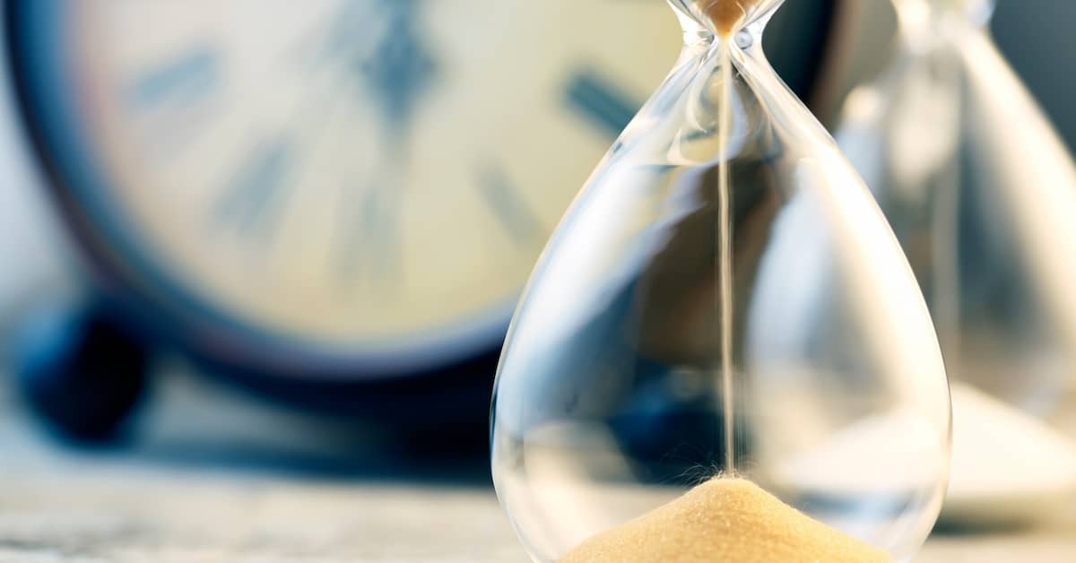 An hourglass with sand. | Bernheim Kelley