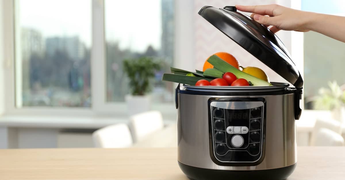 Opening lid of a pressure cooker. | Bernheim Kelley